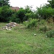 Terra con una casa fatta crollare