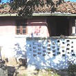 Una casa di piano a piede di Tahe della montagna