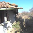 Una casa di piano a piede di Tahe della montagna