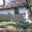 Una casa di piano a piede di Tahe della montagna