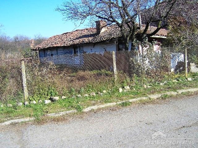 Una casa di piano a piede di Tahe della montagna